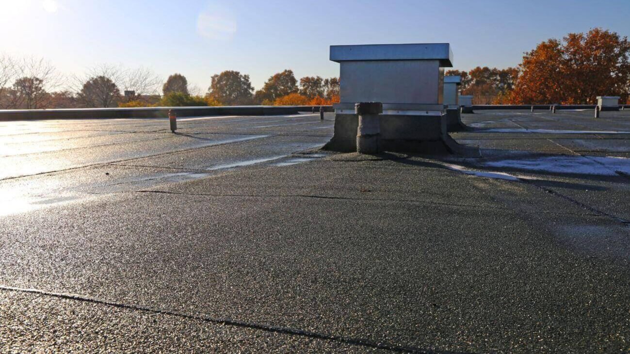 Why Do Commercial Buildings Have Flat Roofs