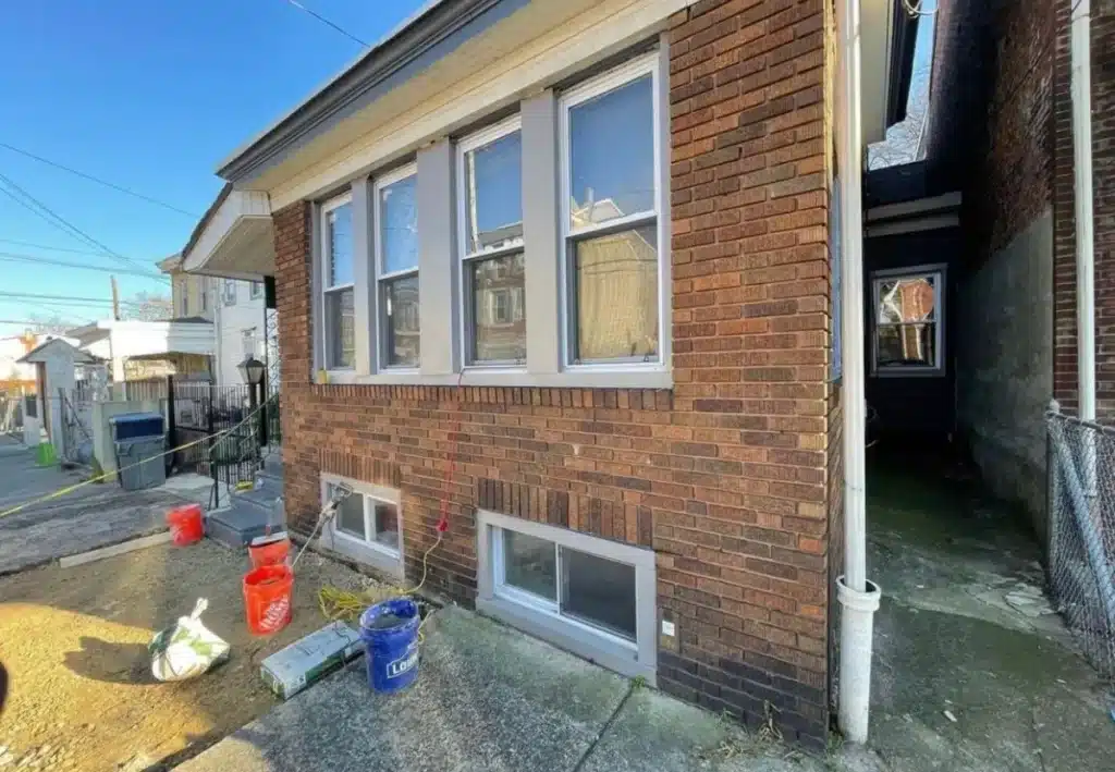 Masonry contractor in Bensonhurst, NY restoring brick facade