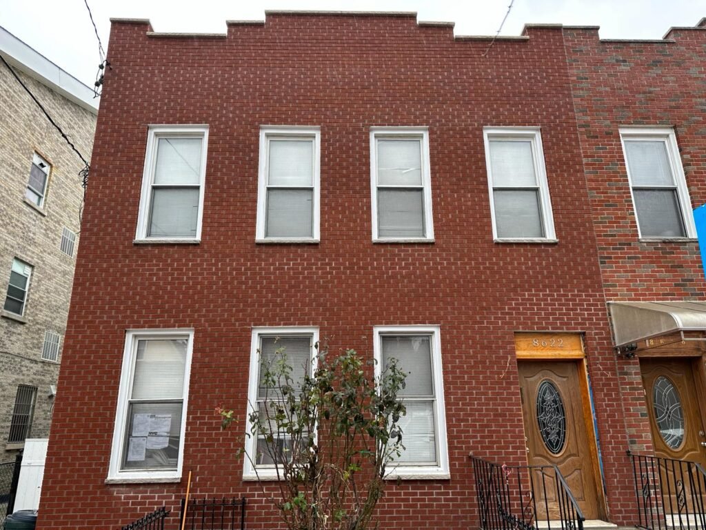 Restored parapet wall brick pointing in Brooklyn, NY