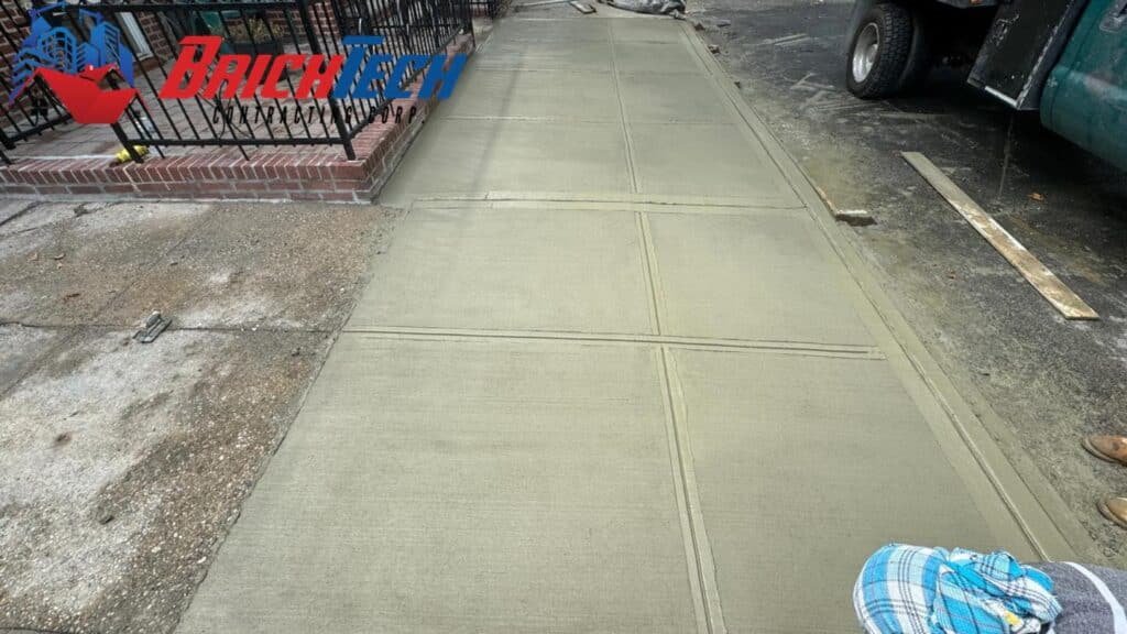 Sidewalk repair in Brooklyn, NY by Brick Tech Contracting Corp