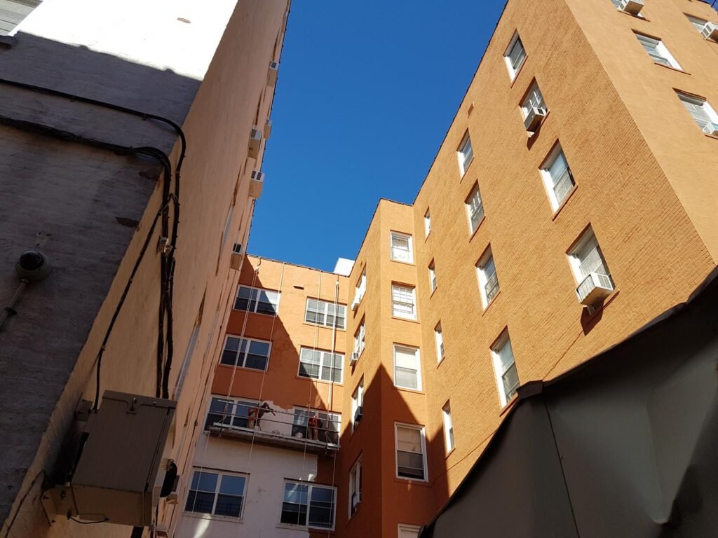 Exterior wall waterproofing on a brick building in Bay Ridge, NY