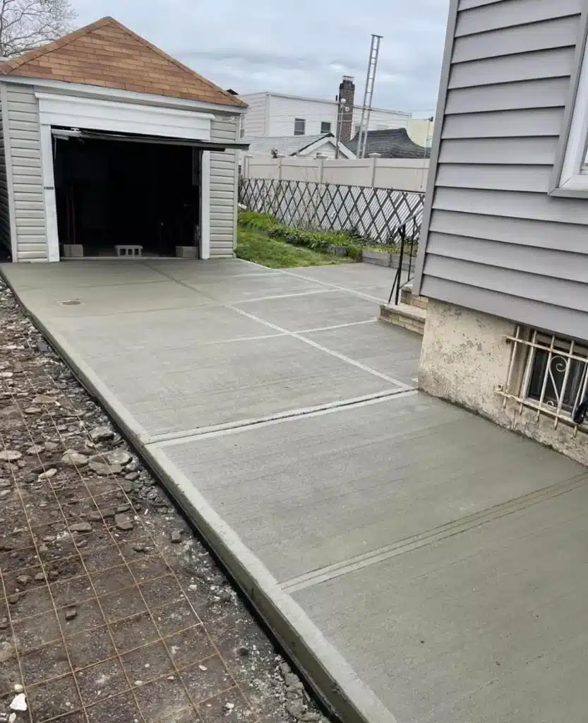 Concrete driveway masonry installation in Dyker Heights, NY