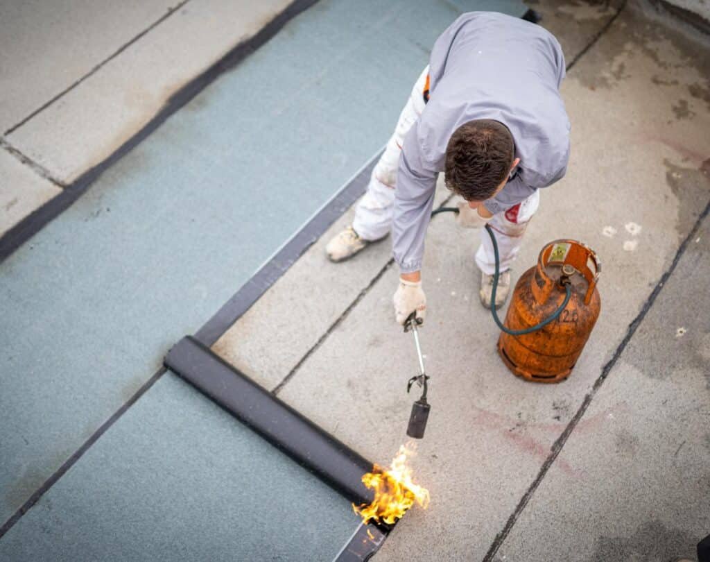Flat roof installation on a Brooklyn apartment building