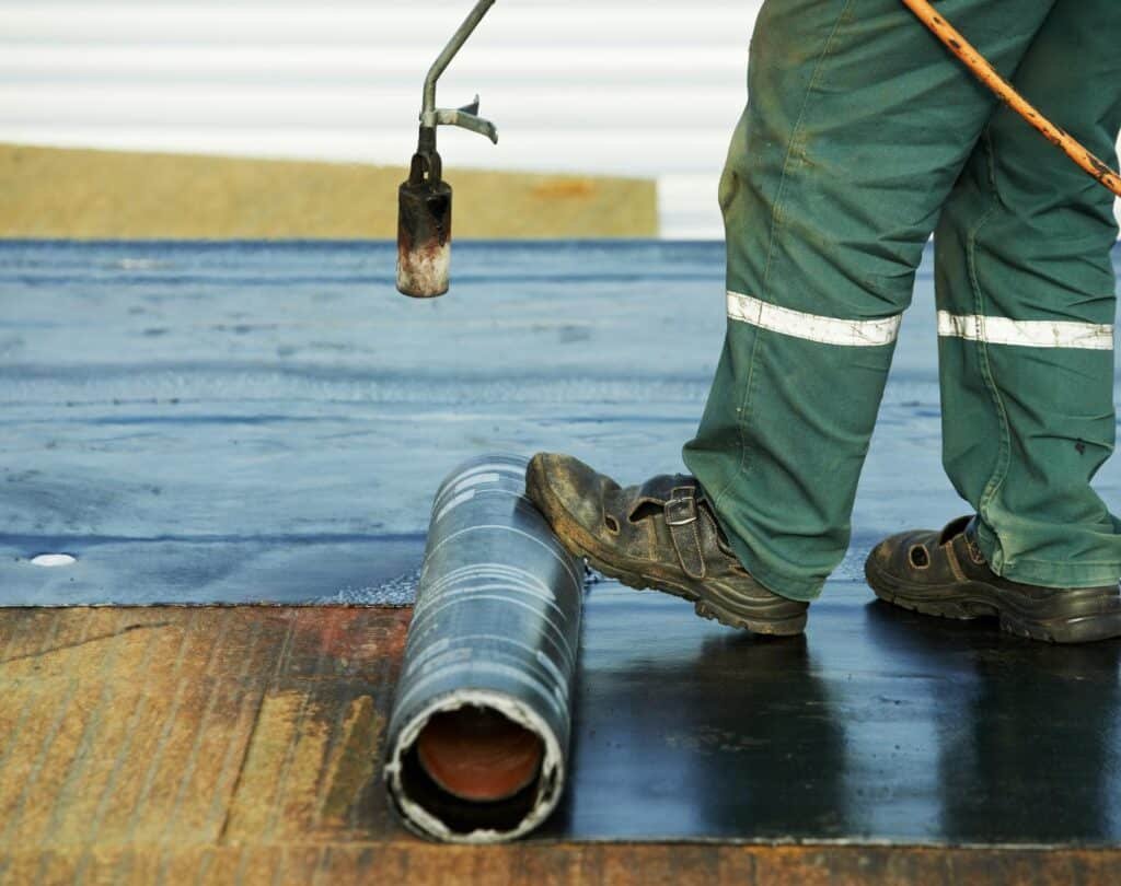 Flat roof patching and sealing project in Brooklyn, NY