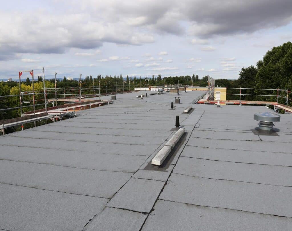 Commercial flat roof installation in Borough Park, NY by Brick Tech Contracting Corp