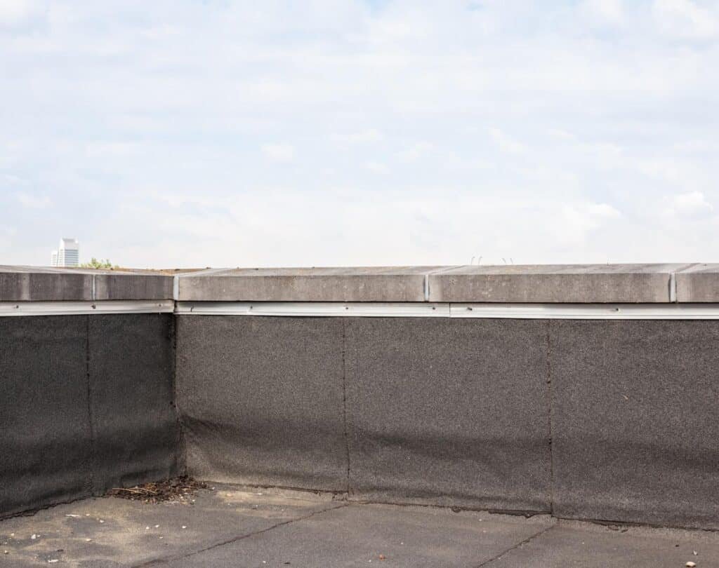 EPDM commercial roof repair on a Canarsie business property