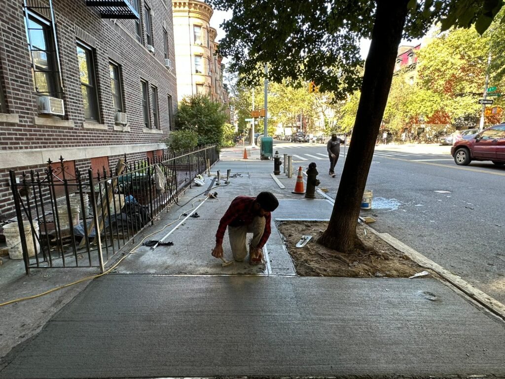 Concrete sidewalk repair in Dyker Heights, NY by Brick Tech Contracting Corp