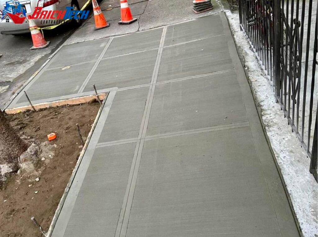 Concrete sidewalk repair in Sunset Park, NY by Brick Tech Contracting Corp