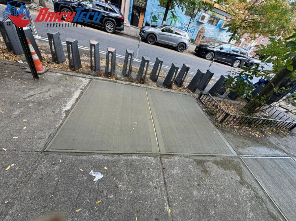 Concrete sidewalk repair in Williamsburg, NY by Brick Tech Contracting Corp