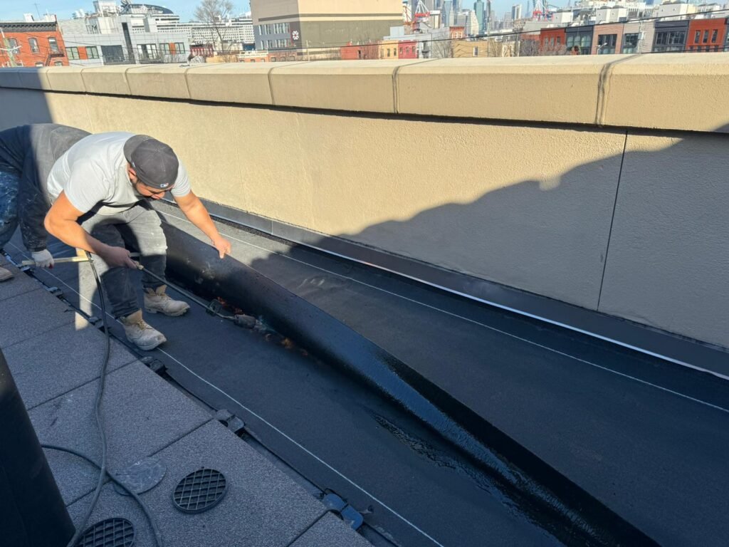 Flat roof repair near me in Manhattan, NY fixing flat roof leaks