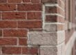 Close-up of historic New York City brickwork showing professional masonry repair and maintenance.