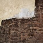 A detailed view of professional brickwork repair on an historic New York City building.